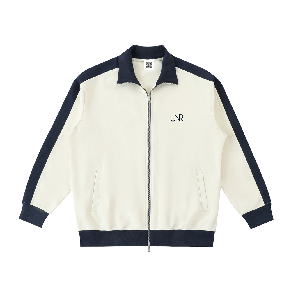 Ivory UNR Heir with navy contrast trim and chest logo, front view